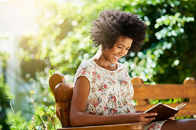 Buy stock photo Shot of an attractive young woman outdoors