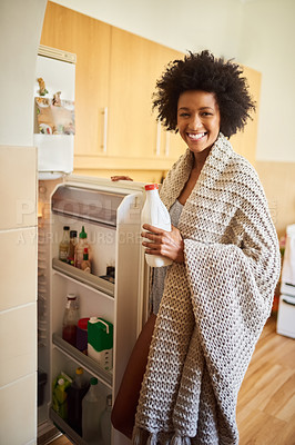 Buy stock photo Woman, smile and portrait in kitchen with milk for breakfast, lazy morning and weekend break. Female person, happy and fridge open with ingredients for cooking, eating and snack or comfort food