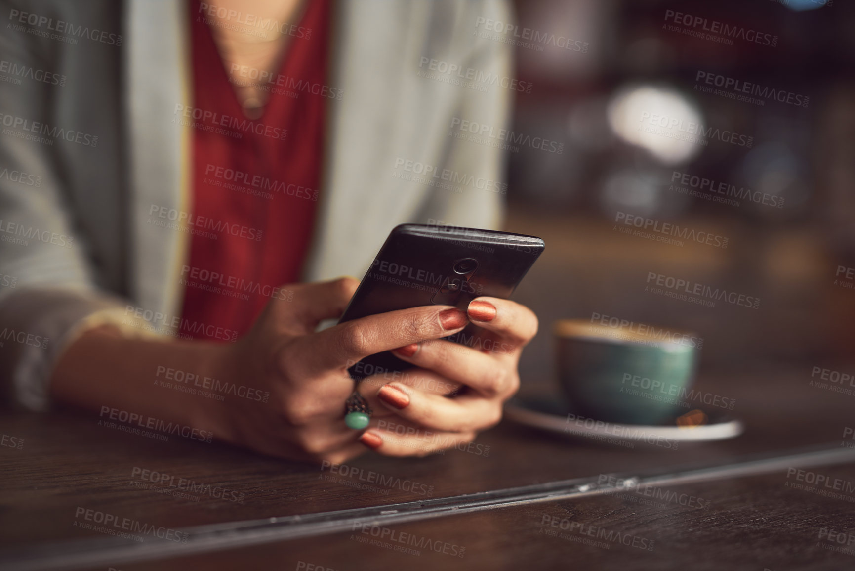 Buy stock photo Woman, hands and typing with phone at coffee shop for research, social media or browsing at indoor restaurant. Closeup of female person or employee on mobile smartphone, texting or chatting at cafe