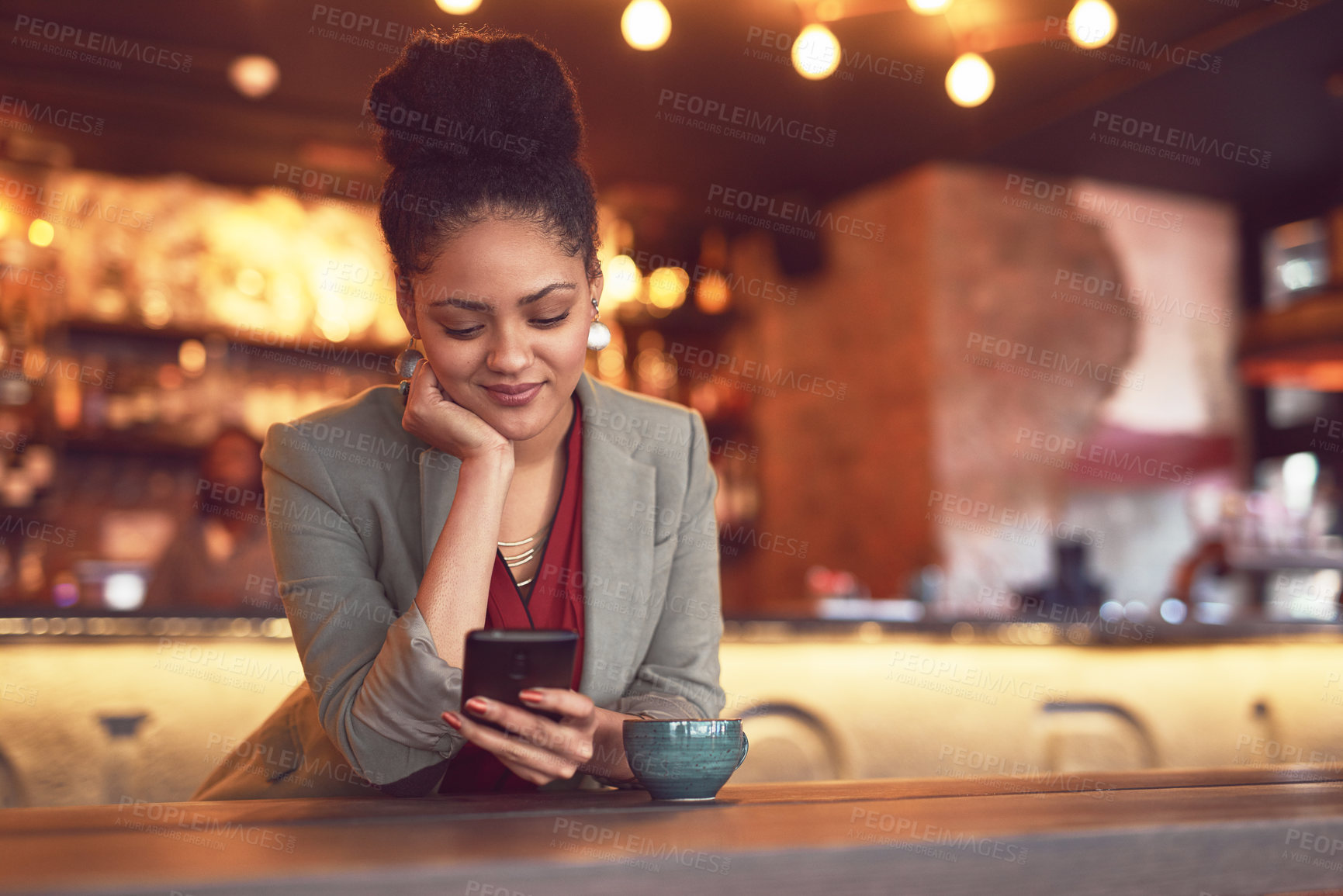 Buy stock photo Business woman, coffee and phone text at restaurant with social media and remote work break with smile. Tech, tea and bar with online, digital and web scroll at cafe table with drink and internet