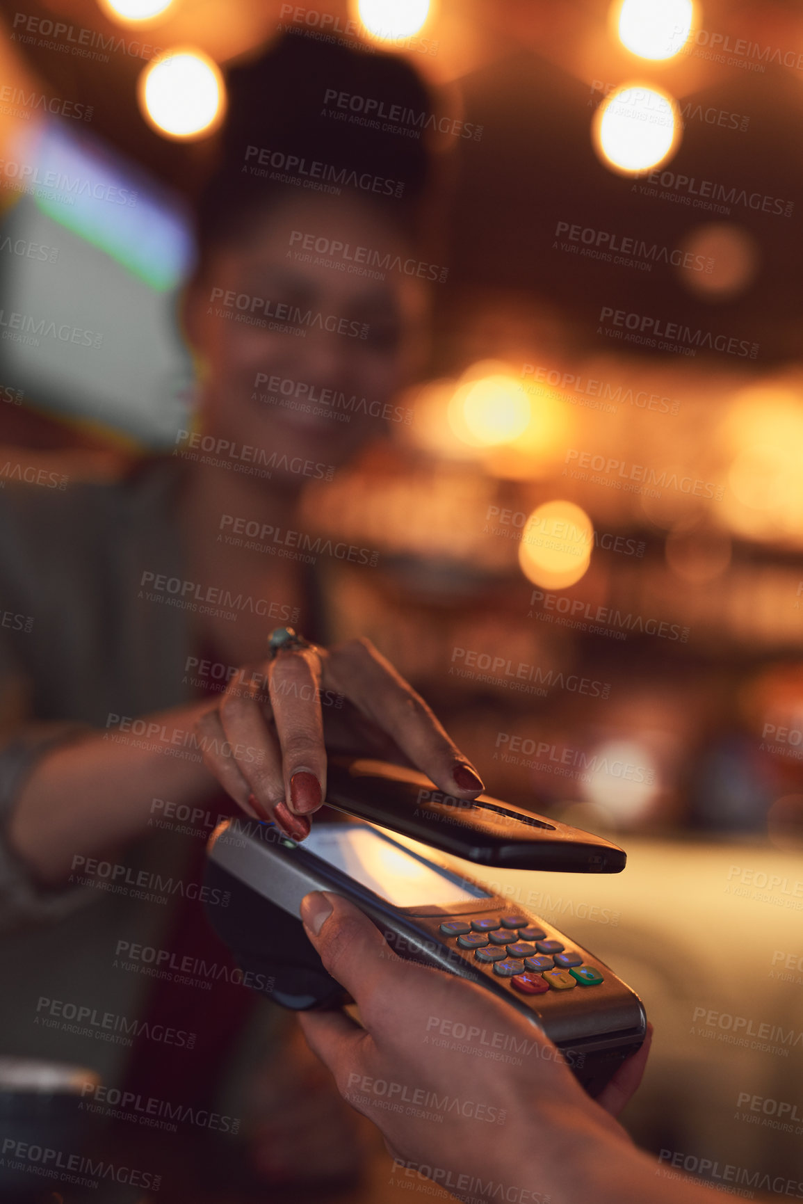 Buy stock photo Phone, machine and woman paying in cafe for online card payment with hospitality service. Pos, barista and female person with cellphone for electronic transaction at checkout in restaurant at night.