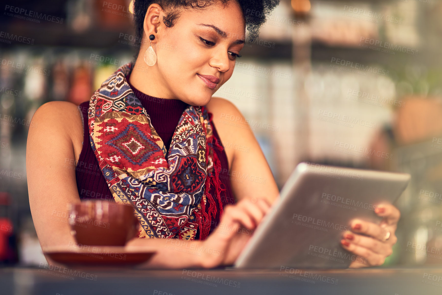 Buy stock photo Tablet, scroll and woman in coffee shop to relax, reading email or blog article in restaurant. Digital technology, customer and girl in cafe on social media, internet or research information online