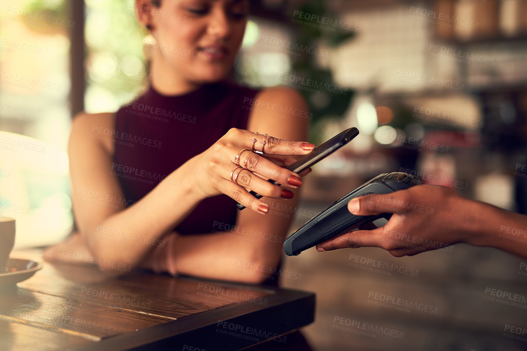 Buy stock photo Woman, hands and phone for pos in coffee shop, payment and transaction on electronic machine. Female person, fintech and restaurant for ecommerce , internet currency and online service for checkout