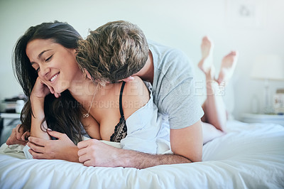 Buy stock photo Love, affection and couple in bed with romance, smile and morning bonding in apartment. Relationship, man and woman in bedroom with intimate embrace, passion and relax with care on weekend in home