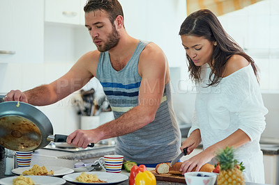 Buy stock photo Cooking, morning and couple in kitchen with food for meal prep for breakfast, brunch and lunch in home. Love, dating and man and woman with vegetable ingredients for health, wellness and nutrition