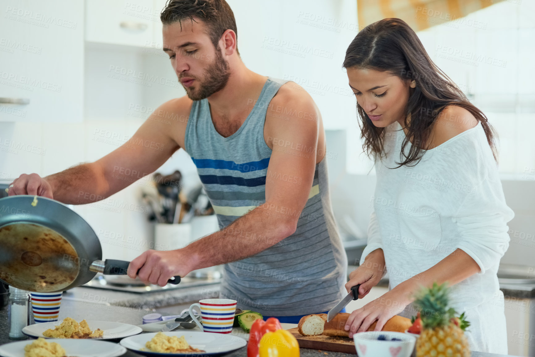 Buy stock photo Cooking, morning and couple in kitchen with food for meal prep for breakfast, brunch and lunch in home. Love, dating and man and woman with vegetable ingredients for health, wellness and nutrition