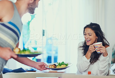 Buy stock photo Breakfast, home and couple with food serving, happy and love together with marriage at table. Hungry, smile and excited woman with eggs and cooking in a new house with anniversary and romance