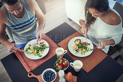 Buy stock photo Love, romance and couple with breakfast, eating or happy morning together in hotel room for honeymoon. Nutrition, bonding and man at table with woman, healthy food and coffee on weekend from above.