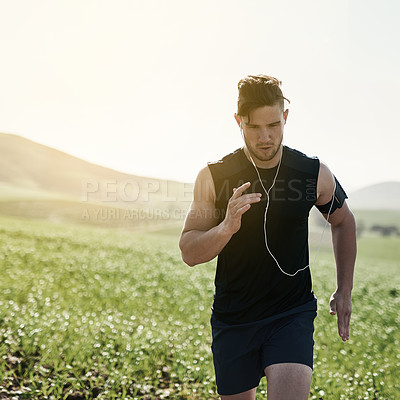 Buy stock photo Cropped shot of a handsome young man running outdoors