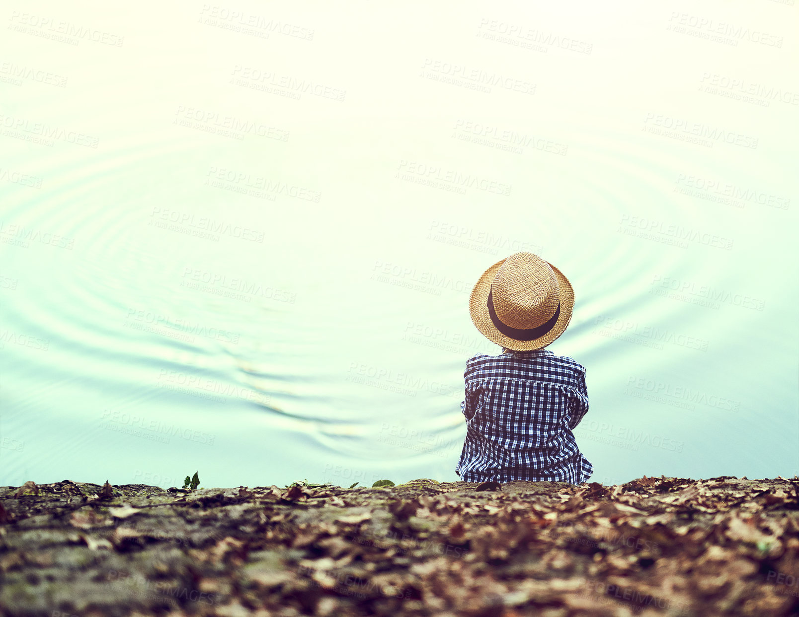 Buy stock photo Lake, pond and boy fishing on vacation, adventure or weekend trip for autumn hobby. Back, nature and child or kid catching fish in water on outdoor holiday in scotland countryside with straw hat