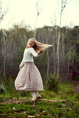 Buy stock photo Outdoor, girl and kid in nature, happiness and playful with smile, celebration and excited for weekend break. Forest, cheerful and childhood with nature, fun and dance with freedom, relax or carefree