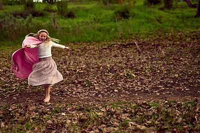 Buy stock photo Shot of a young girl enjoying some time outdoors