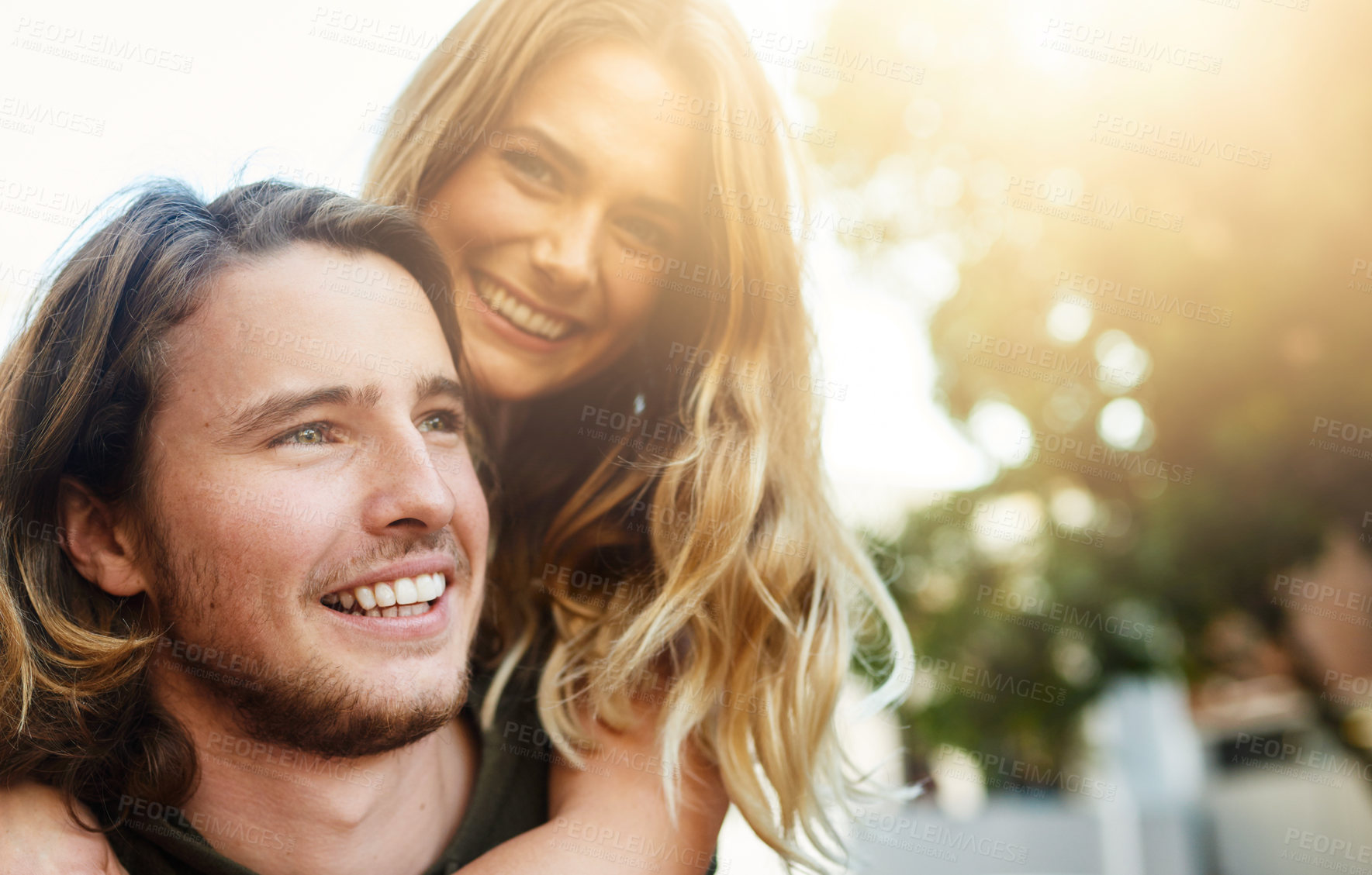 Buy stock photo Piggyback, travel and happy couple in city bonding together for relationship or tourism for weekend break. Smile, outdoor and people in urban town street for adventure, holiday or vacation in Miami