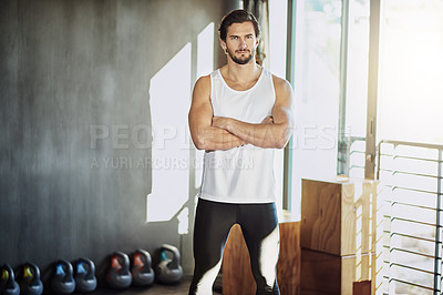 Buy stock photo Crossed arms, fitness and portrait of man in gym for intense training, exercise and cardio workout. Sports, personal trainer and serious person for wellness, healthy body and performance with muscles