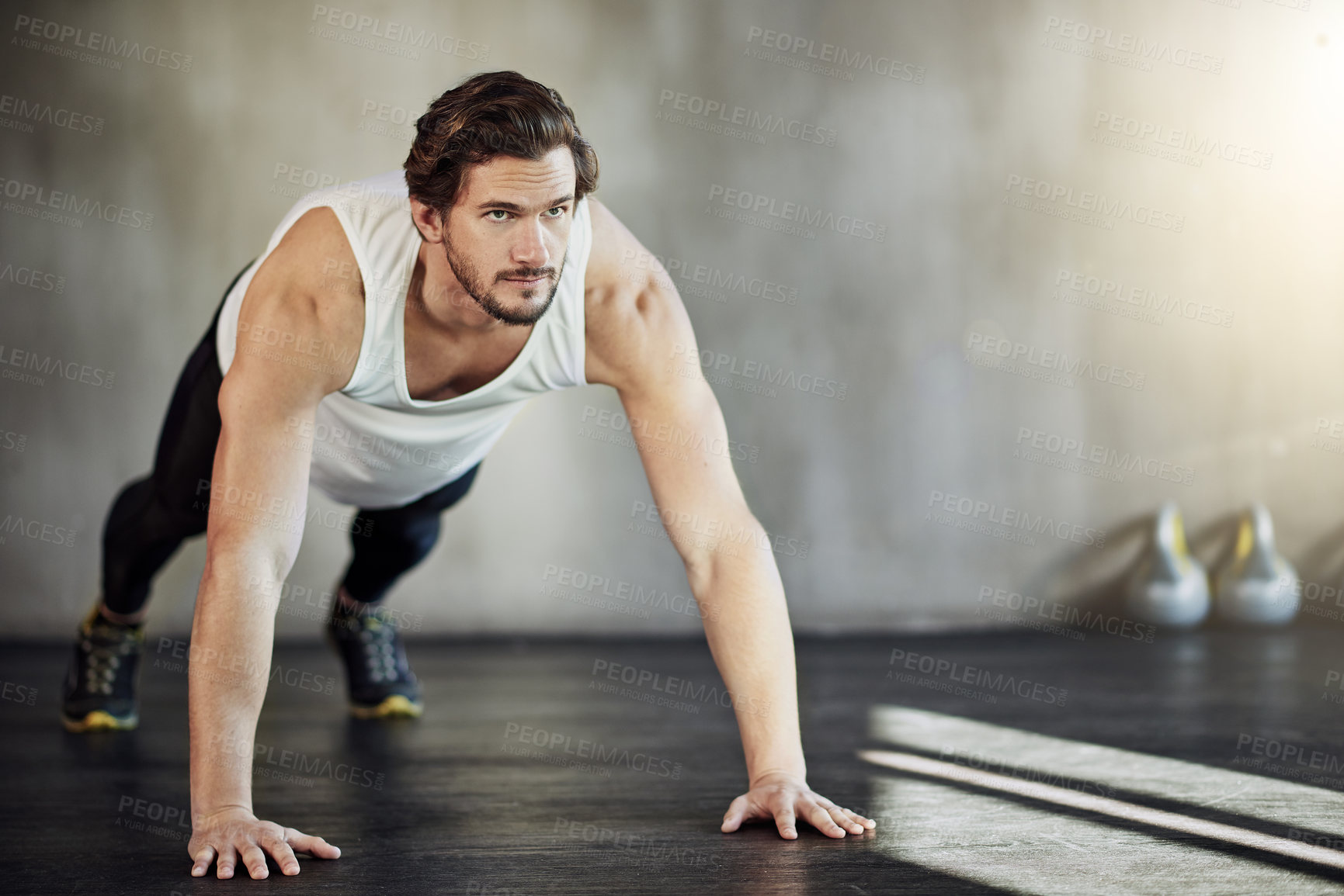 Buy stock photo Health, exercise and man in gym with pushup for strong body, wellness and workout routine for arms. Sports club, plank action and male athlete with discipline for muscle growth and training goals