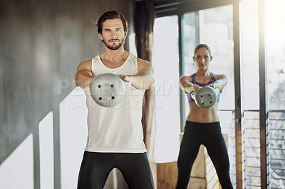 Buy stock photo People, kettlebell and muscle training at gym, weightlifting and equipment for power workout. Man, woman and personal trainer for athletes challenge, cardio fitness and friends support for exercise