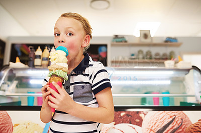 Buy stock photo Ice cream, portrait and kid in store for dessert, craving or sweet treat on summer vacation. Happy, cute and boy child eating scoop of frozen gelato in cone at dairy shop on holiday or weekend trip.