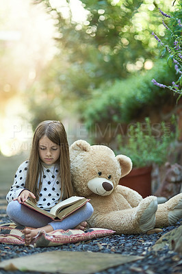 Buy stock photo Outside, teddy bear and girl with book for reading, education and language development. Backyard, toys and female child with textbook for storytelling, drawing and entertainment with fantasy