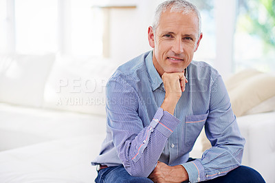 Buy stock photo Senior, man and portrait for relax on sofa with happiness, retirement and wellness in living room. Elderly, person and face with smile, confidence or peaceful in home of apartment with mockup space