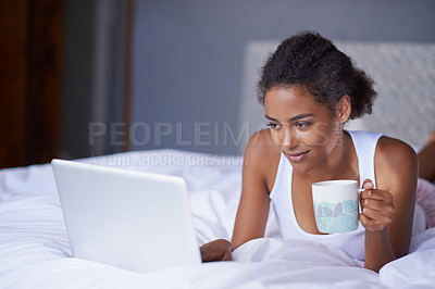 Buy stock photo Black woman, computer or tea in bed to relax, scroll or search on internet, social media or network. Female influencer, coffee or laptop as checking, message or email for viral meme and blog post