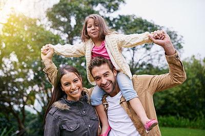 Buy stock photo Mother, father and child in portrait in park with love, bonding and support at outdoor family adventure. Smile, parents and girl walking in garden together with happy man, woman and kid in nature