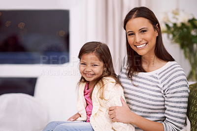 Buy stock photo Portrait, mom and girl with smile in living room, embrace and home with love, care and happiness. Apartment, mother and kid in lounge to relax on sofa or couch with hug for bonding in family house