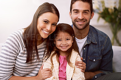 Buy stock photo Mom, father and girl on sofa for portrait with love or care, quality time and family bonding for memories or connection. Parents, kid and together for comfort or safety on weekend, hug and happiness.