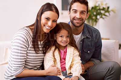 Buy stock photo Mother, dad and girl in home for portrait with love or care, smile and family bonding for memories or connection. Parents, kid and together for comfort or safety on weekend, hug and happiness.