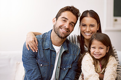 Buy stock photo Mom, dad and girl on sofa for portrait with love or care, quality time and family bonding for memories or connection. Parents, child and together for comfort or safety on weekend, hug and happiness.