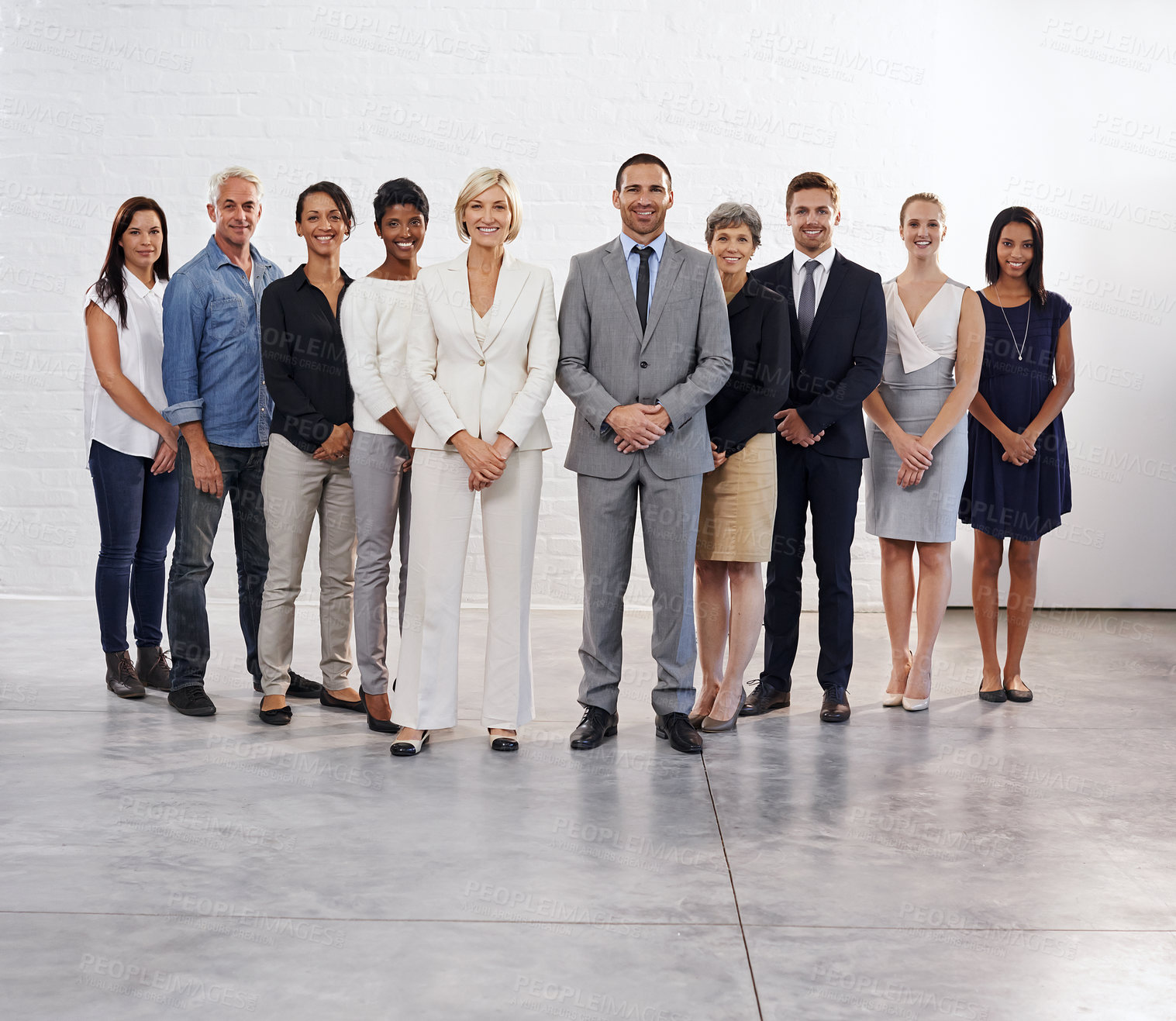 Buy stock photo Studio shot of a diverse group of people standing together