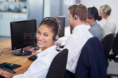 Buy stock photo Help desk, phone call and row with portrait of happy woman at customer support office with headset. Smile, telecom and client service agent at callcenter for online consultation, team and computer