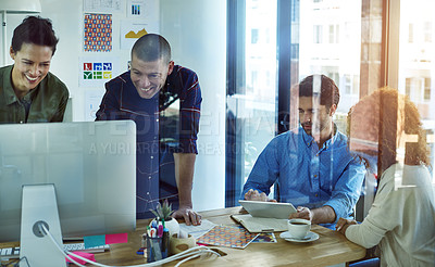 Buy stock photo Shot of businesspeople working in teams in a modern office