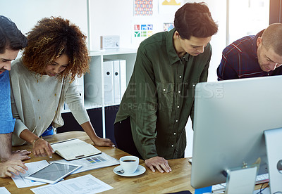 Buy stock photo Shot of businesspeople working in teams in a modern office