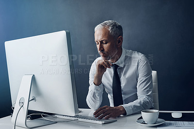Buy stock photo Computer, thinking and business man at desk working on online project, planning and writing email. Corporate worker, office and mature male person typing on PC monitor for review, website or research