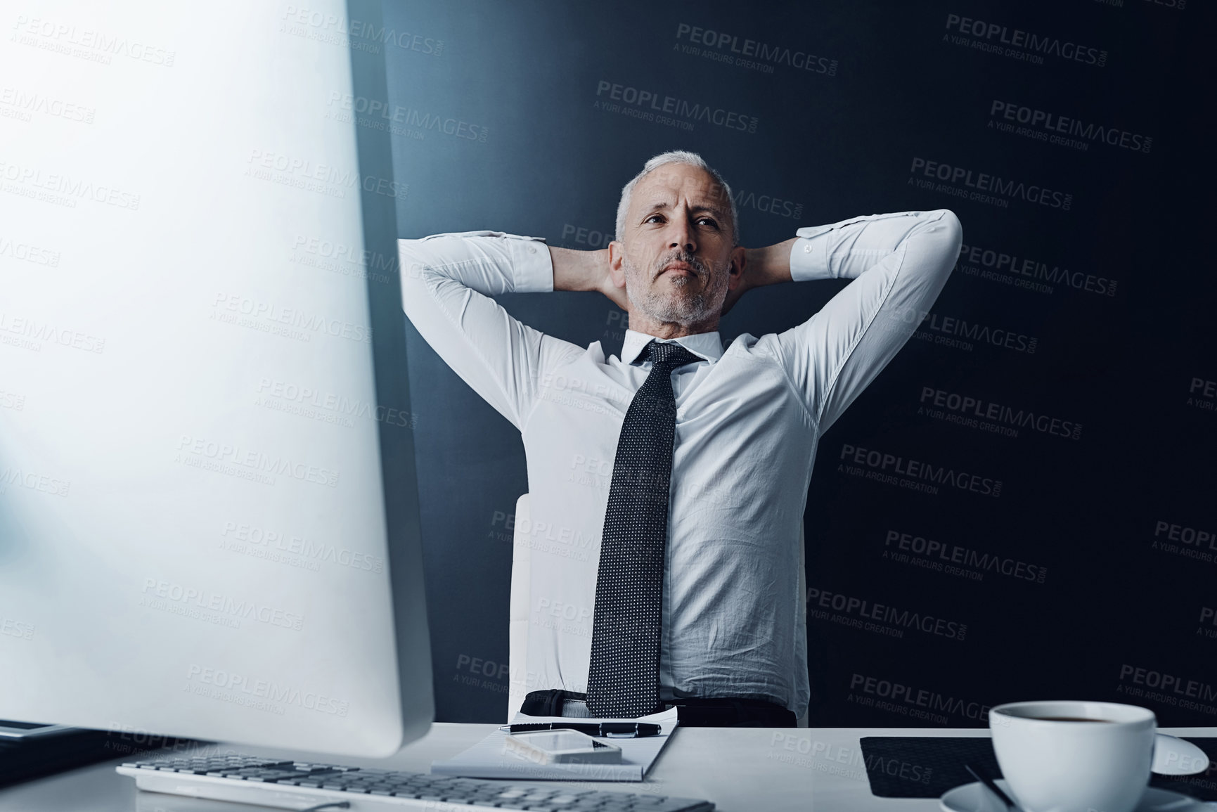 Buy stock photo Relax, mature businessman thinking and against studio background at desk for idea. Comfortable or carefree, positive mindset or relaxation and male person pose for leisure during break at workspace