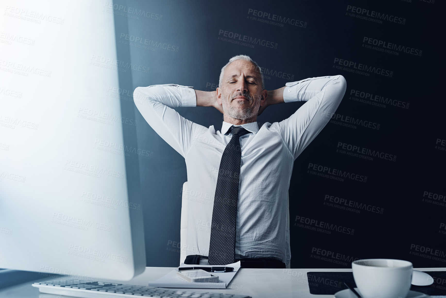 Buy stock photo Senior business man, pride and relax in office for satisfaction, achievement or target at finance company. Mature ceo, relief or rest at desk with hands behind head, eyes closed or peace in workplace