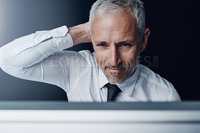 Buy stock photo Brainstorming, planning and mature businessman working on project with a computer or technology. Career, thinking and professional senior male person doing corporate research on desktop in workplace.