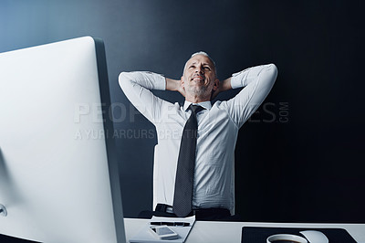 Buy stock photo Elderly business man, pride and relax in office for satisfaction, achievement and smile at finance company. Mature ceo, relief or rest at desk with hands behind head, happy or thinking in workplace