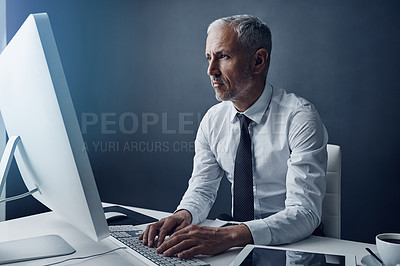 Buy stock photo Computer, typing accountant and mature man in office, working and isolated on a studio background mockup. Tech, writing and serious manager at desktop for reading email, research or business auditor.