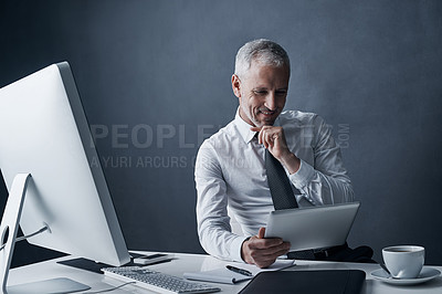 Buy stock photo Tablet, thinking and senior business man in studio isolated on a dark background mockup. Technology, planning and happy manager at desk for idea, problem solving or reading for solution in company.