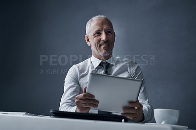 Buy stock photo Tablet, office and business man online for social media, internet and browse website at desk. Thinking, corporate worker and happy mature male person on digital tech for message, email and planning