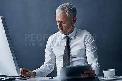 Buy stock photo Tablet, computer and business man in office online for social media, internet and browse website at desk. Networking, corporate worker and mature male person on digital tech for ideas and planning