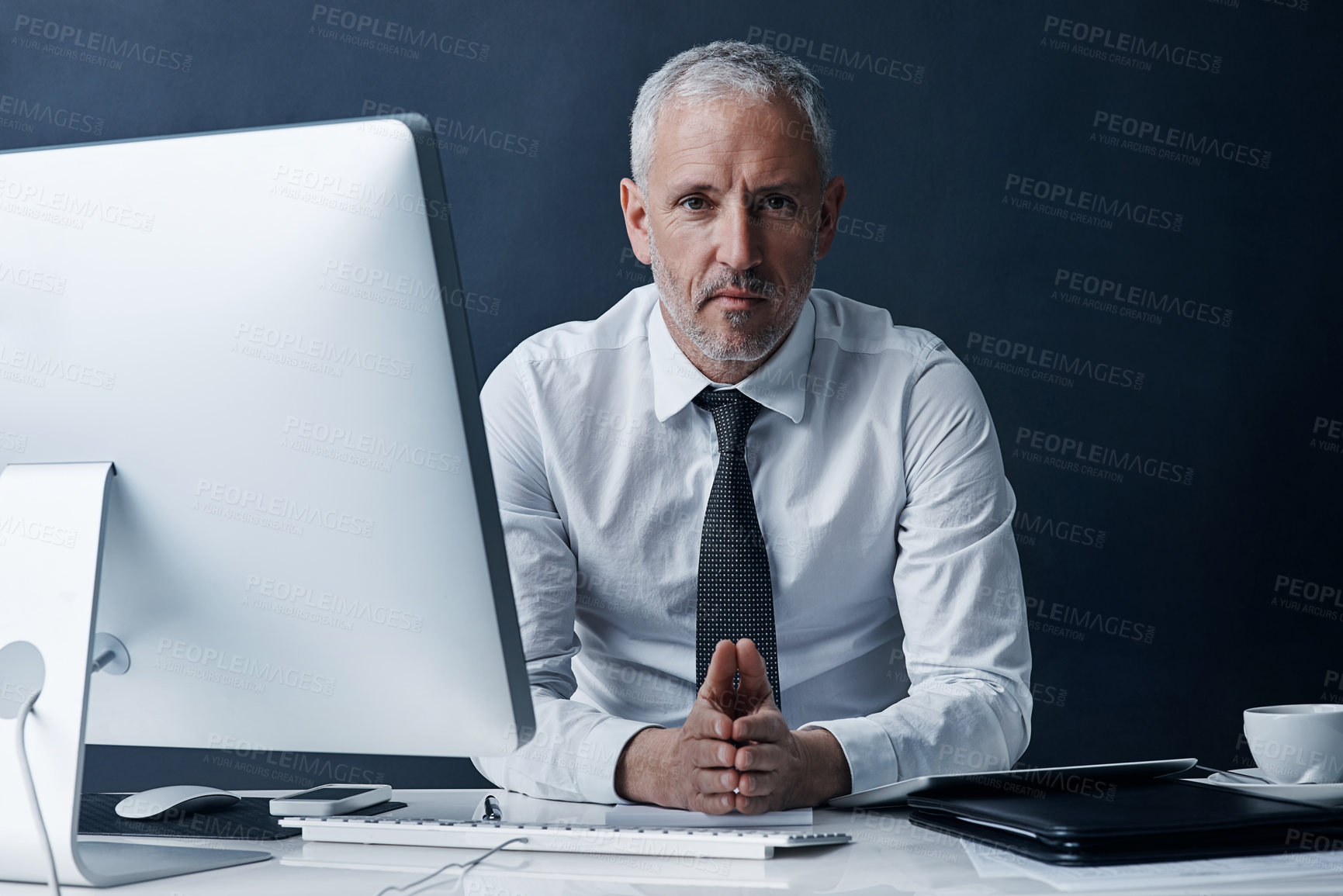 Buy stock photo Portrait, business and mature man with computer, professional and pride on dark background. Face, person and entrepreneur in modern office, technology and corporate attorney with career ambition