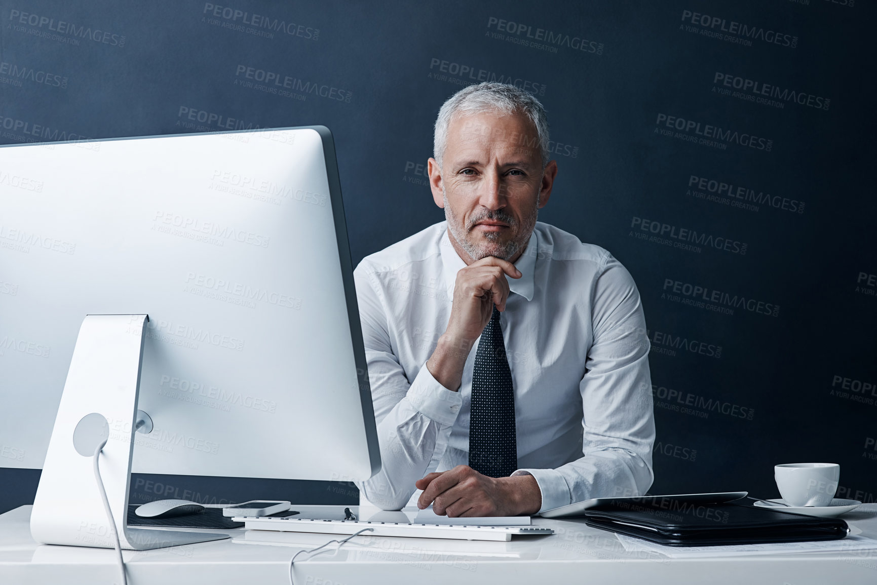 Buy stock photo Thinking, mature or portrait of businessman on computer with confidence or dark background. Finance, financial advisor or accountant manager on desktop for research or revenue growth ideas in France