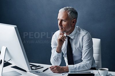 Buy stock photo Thinking, office and business man on computer for online project, internet and browse website at desk. Technology, corporate worker and mature male person on pc for research, email and planning