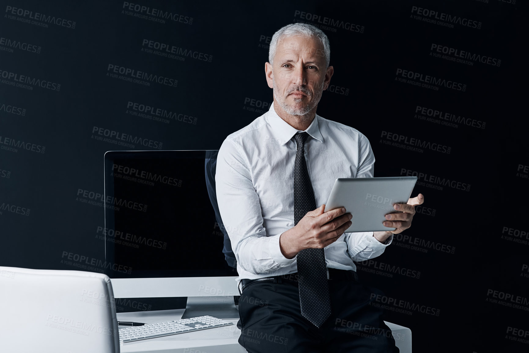 Buy stock photo Tablet, computer and portrait of business man at desk for social media, internet and website in office. Online, corporate and mature male person on digital tech for email, research and planning
