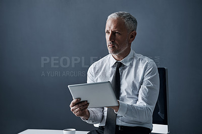 Buy stock photo Tablet, thinking and senior business man online for social media, internet and website at desk. Ideas, corporate worker and mature male person on digital tech for problem solving, email and research