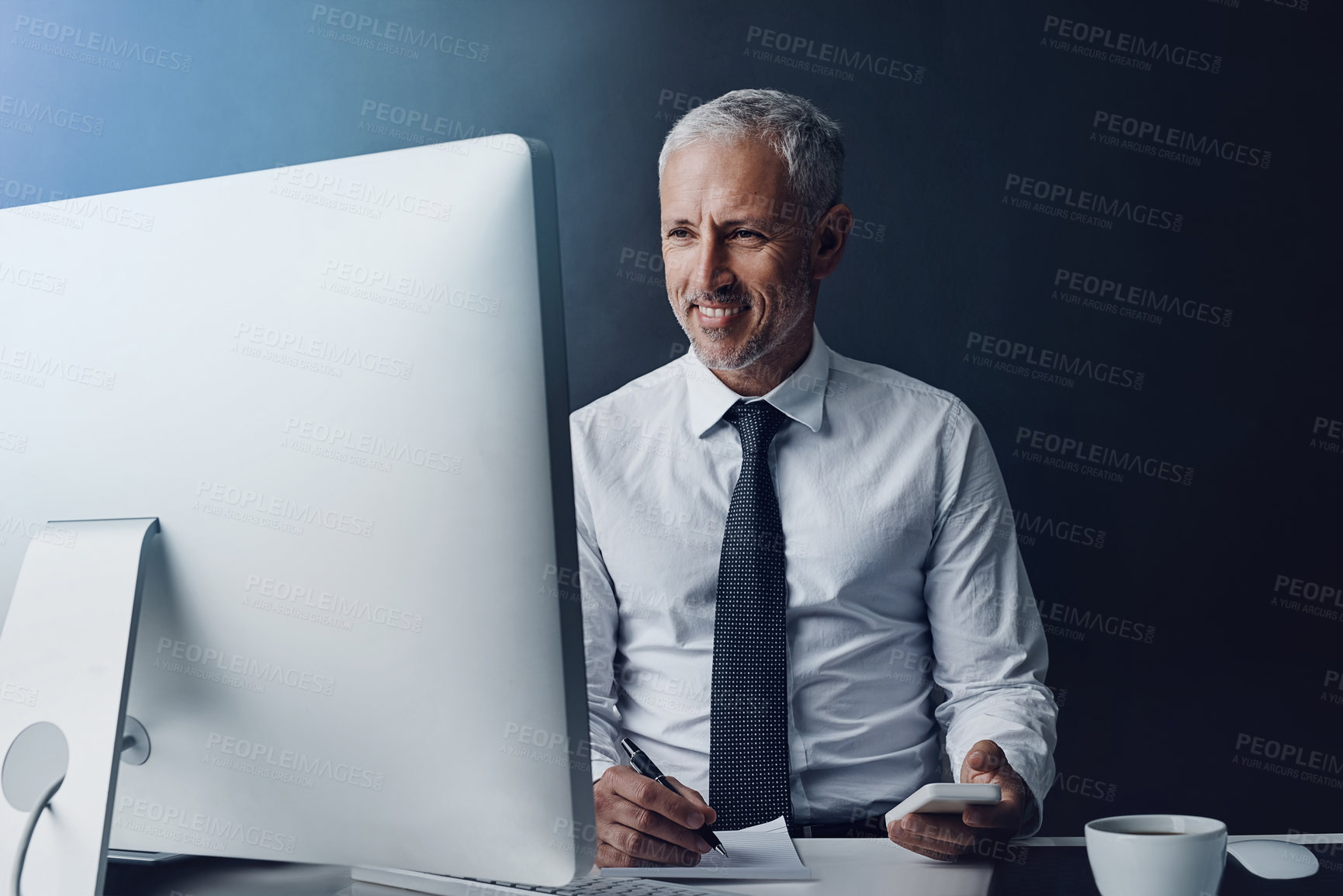 Buy stock photo Writing, computer and business man at desk online for research, internet and browse website in office. Networking, corporate worker and mature male person on smartphone, write notes and planning