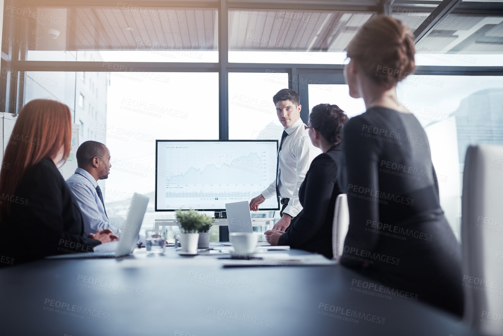 Buy stock photo Monitor, businessman or speaker in a presentation for graphs report or charts data analysis in company. Meeting, manager or mentor planning sales growth on screen in training, mentorship or coaching 