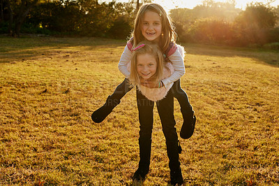 Buy stock photo Portrait of two little girls having fun outside